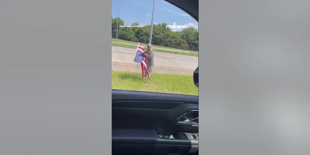 Marine Veteran Rescues American Flag